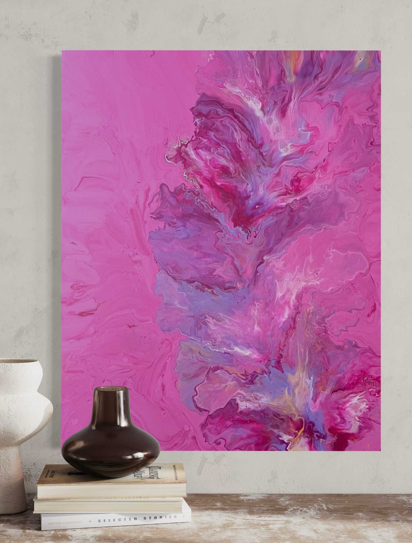 Abstract acrylic painting in vibrant shades of pink, purple and magenta with dynamic flow technique on canvas - modern work of art as an eye-catcher for contemporary living spaces.