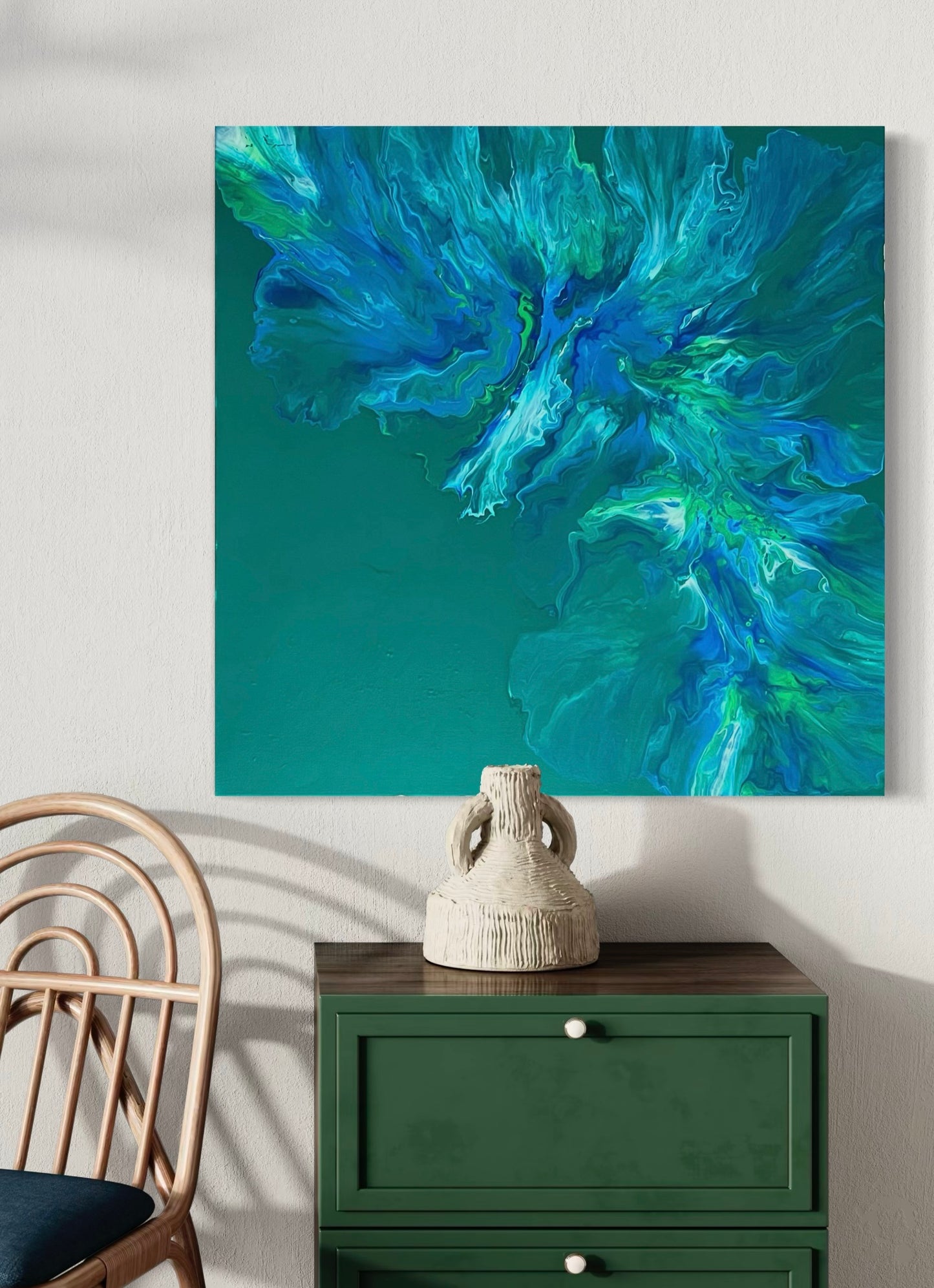 Abstract acrylic painting in strong blue, green and turquoise tones with lively flowing structures on an emerald green background - modern fluid art artwork with organic dynamics for contemporary interiors.
