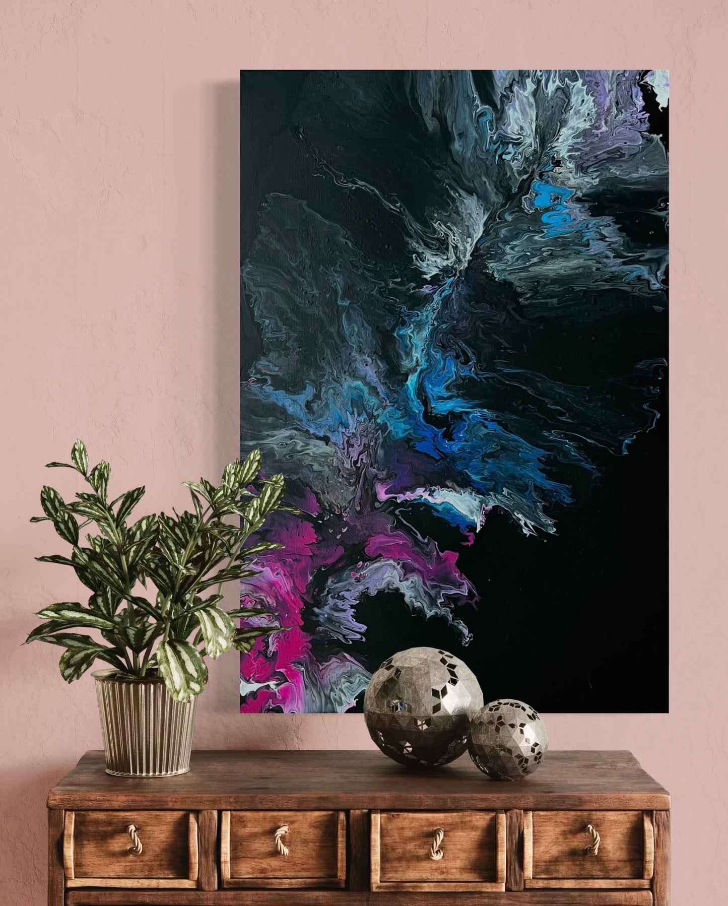 Abstract acrylic painting with dynamic color gradients in blue, turquoise, pink, violet on a black background - modern fluid art artwork with cosmic flair for stylish interior design.