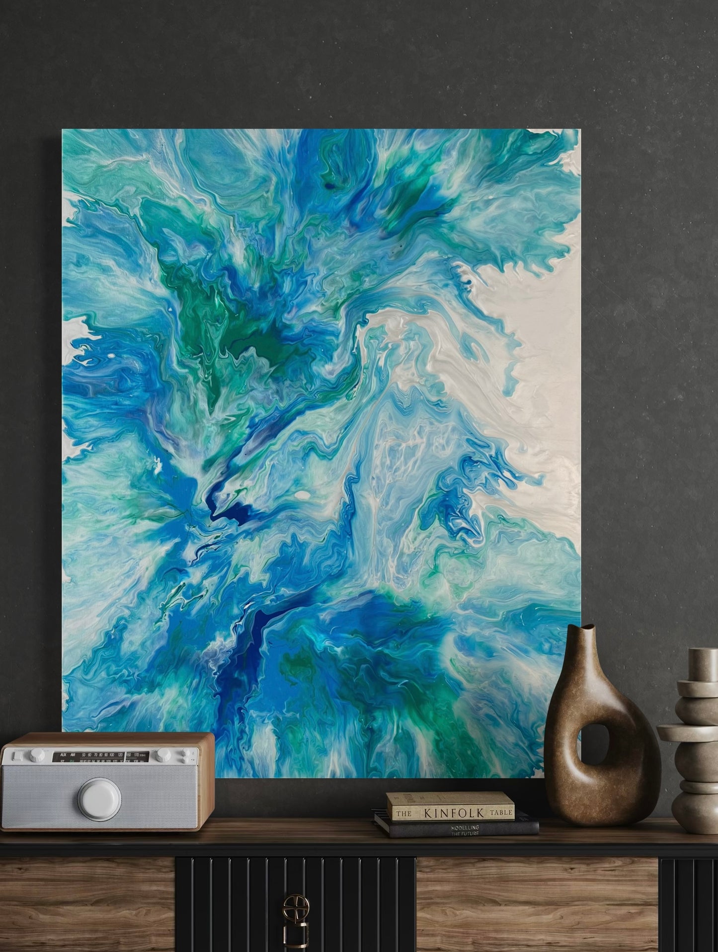 Abstract acrylic painting with vibrant shades of blue, turquoise and silver in a dynamic flow technique - modern fluid art artwork inspired by water and movement, ideal for contemporary living spaces.