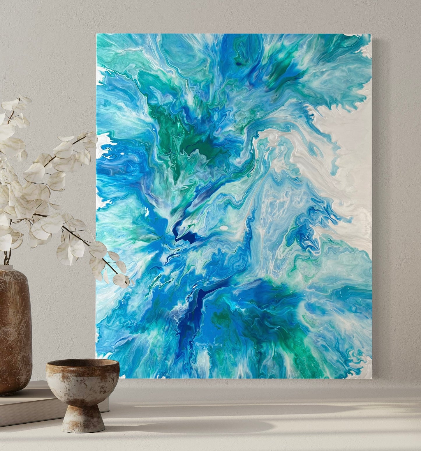 Abstract acrylic painting with vibrant shades of blue, turquoise and silver in a dynamic flow technique - modern fluid art artwork inspired by water and movement, ideal for contemporary living spaces.