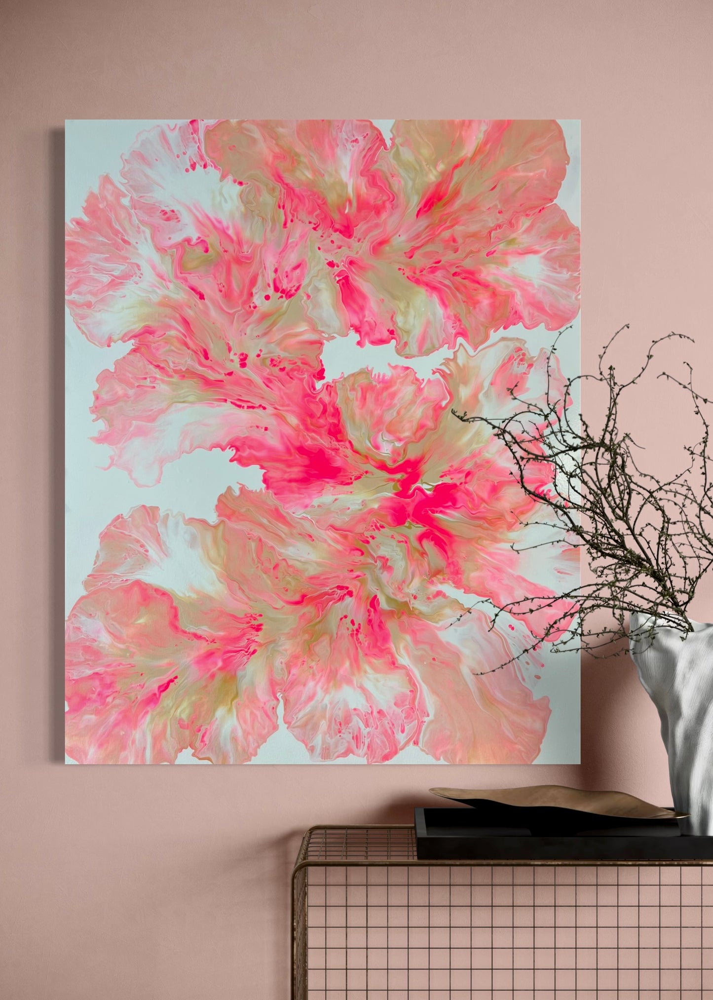 Abstract acrylic painting in bright shades of pink, red, and gold on a white background. The flowing, flower-like shapes are reminiscent of organic leaves or petals and create a lively, harmonious movement. Modern wall art with a feminine and elegant expression, perfect for contemporary interiors.
