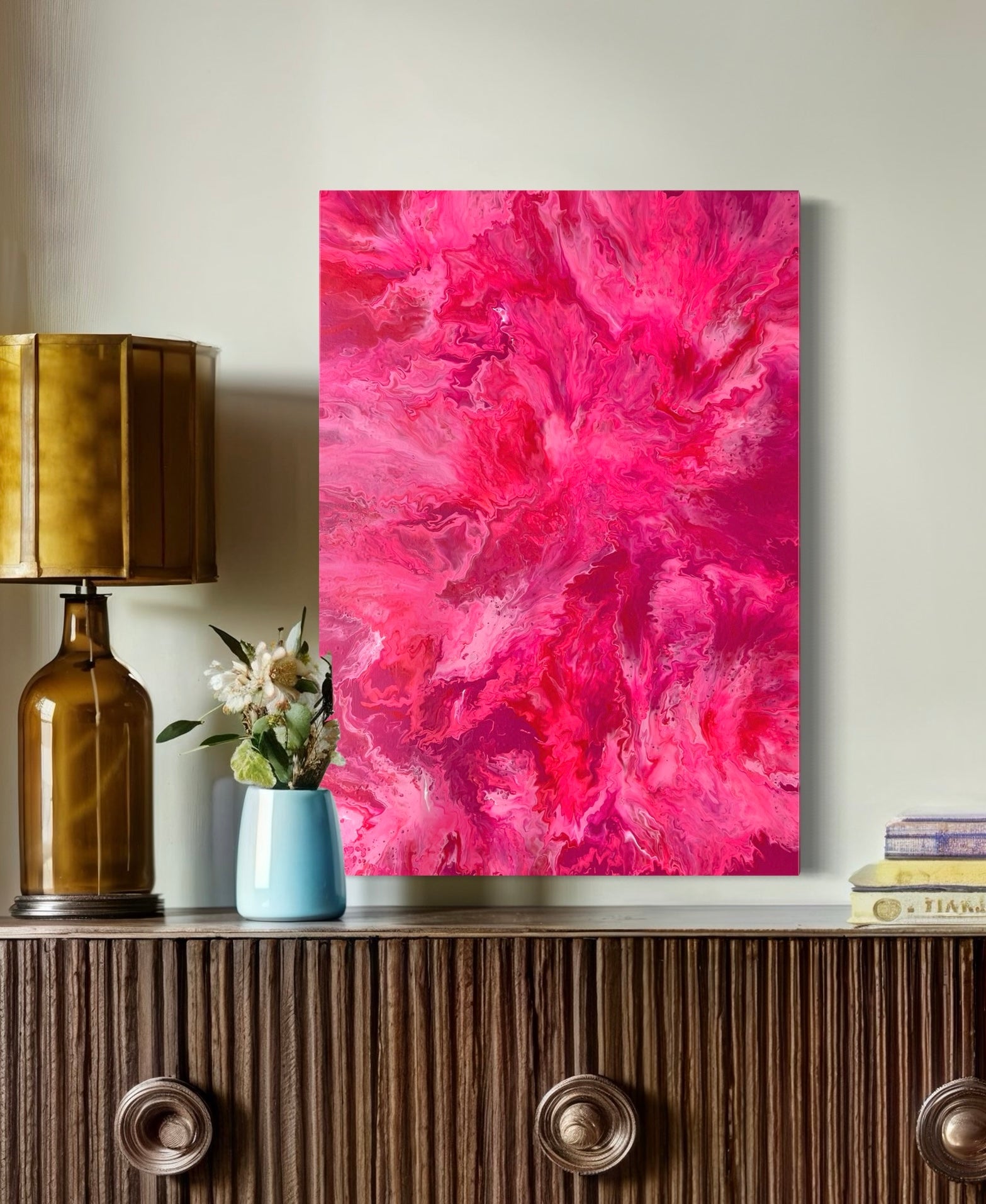 Abstract acrylic painting in intense pink, rose and red tones with organic, flowing shapes - modern fluid art artwork eye-catching color accent for contemporary living spaces.