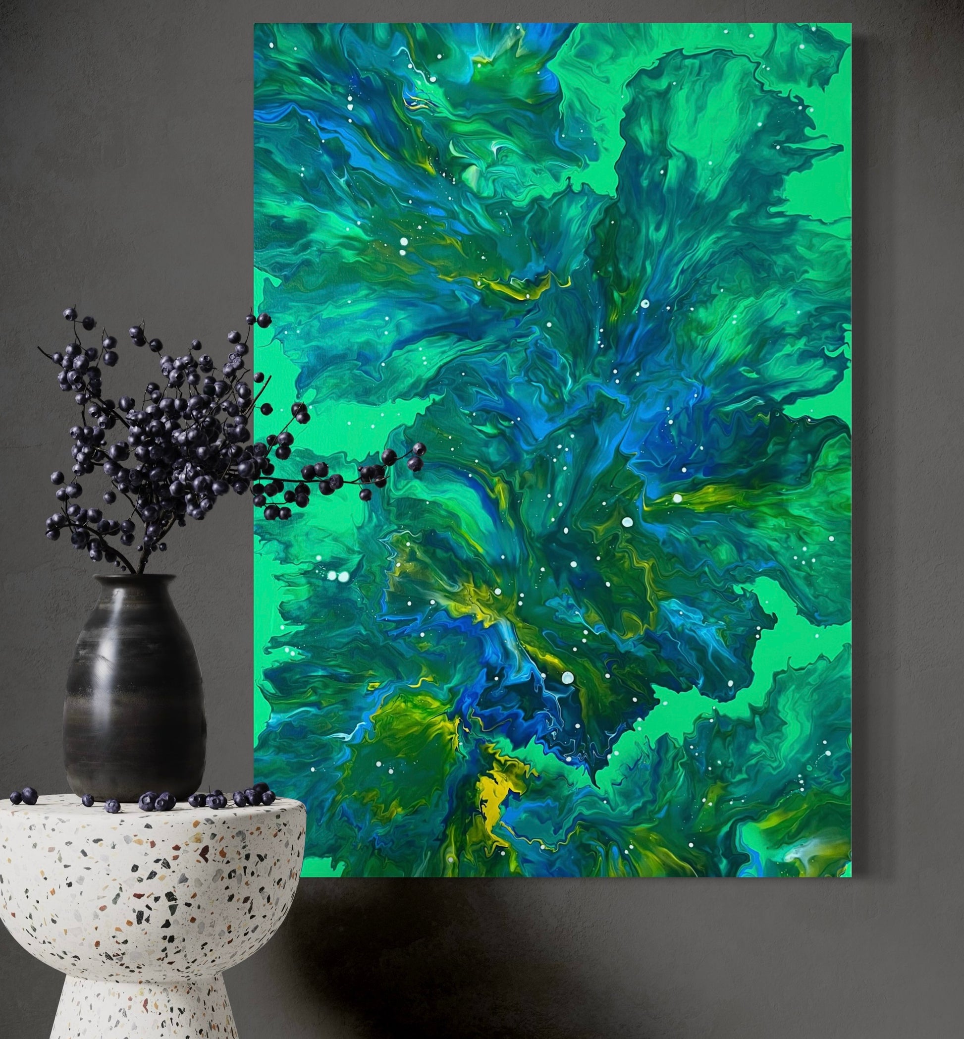Abstract acrylic painting in bright green, blue and yellow with flowing textures and white accents - modern fluid art artwork as a natural color accent for contemporary living spaces.