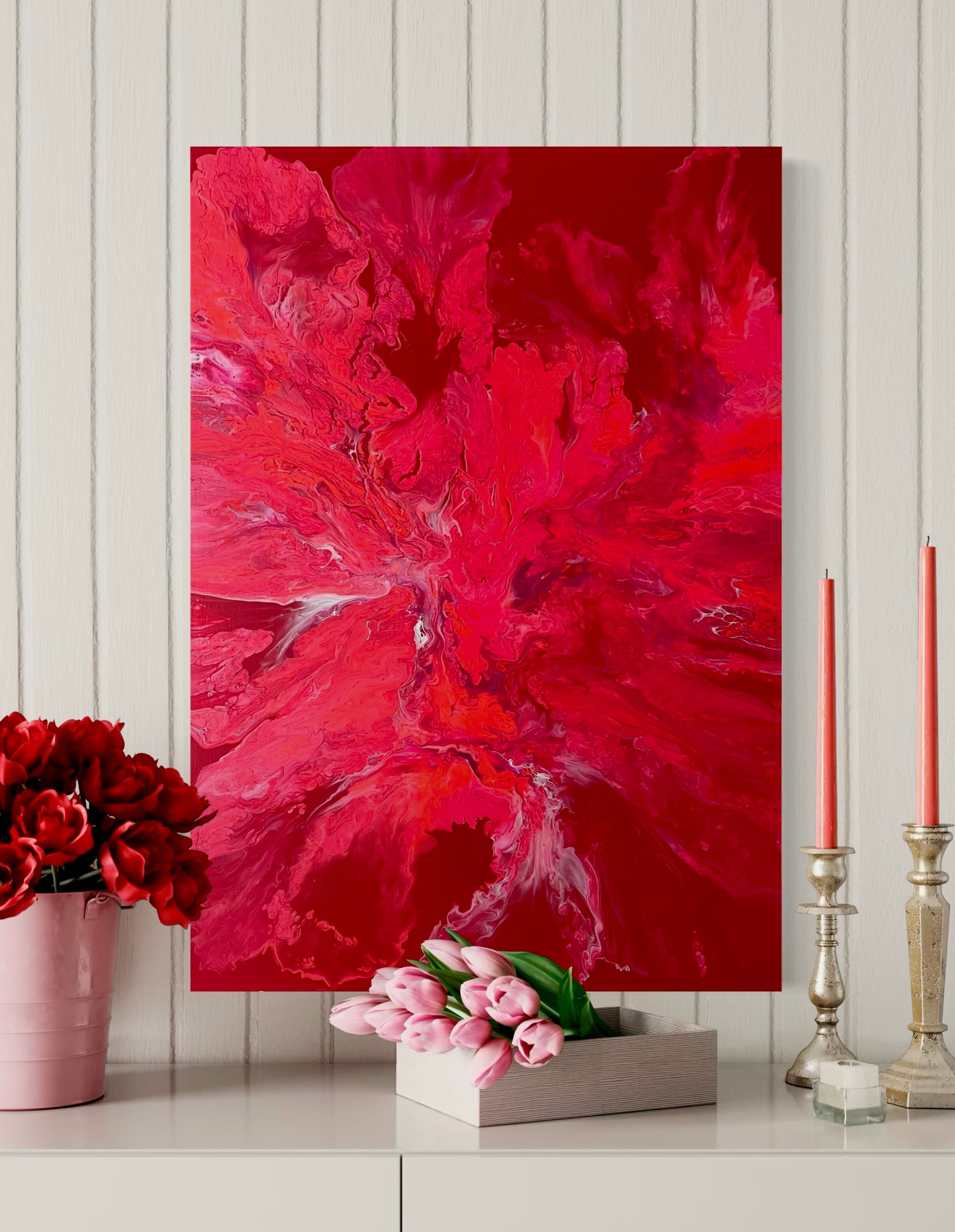 Abstract acrylic painting in intense red tones with flowing structures and dynamic play of colors - powerful fluid art artwork on a red background as a modern eye-catcher for expressive interior design.