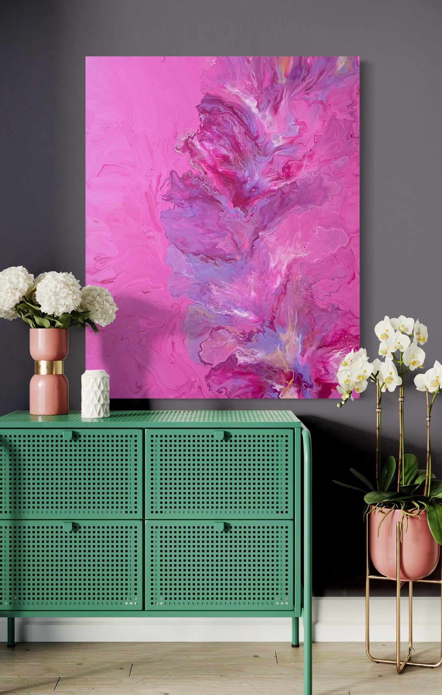 Abstract acrylic painting in vibrant shades of pink, purple and magenta with dynamic flow technique on canvas - modern work of art as an eye-catcher for contemporary living spaces.