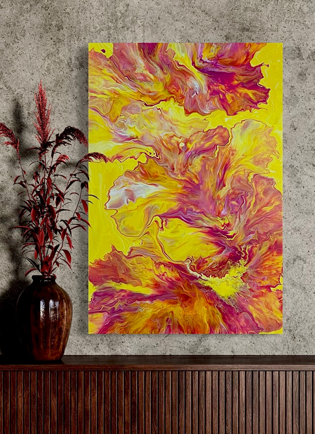 Abstract acrylic painting in intense shades of yellow, orange, pink, and red with flowing, energetic color gradients. The dynamic structure is reminiscent of fire, light, and movement, creating a lively, powerful aura. Contemporary abstract art on canvas—a unique, hand-painted piece, ideal for modern living spaces or galleries.