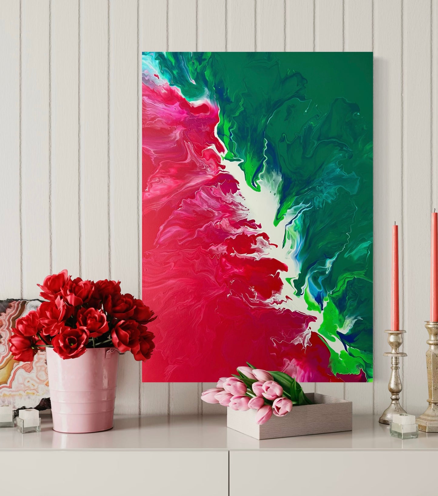 Abstract acrylic painting in bold shades of green and red with flowing transitions and dynamic color energy. The high-contrast composition is reminiscent of natural forces such as growth, fire, and movement, creating a lively tension between calm and intensity. Hand-painted, one-of-a-kind piece in the fluid art style—modern abstract art on canvas, ideal as an eye-catcher in contemporary living spaces and galleries.