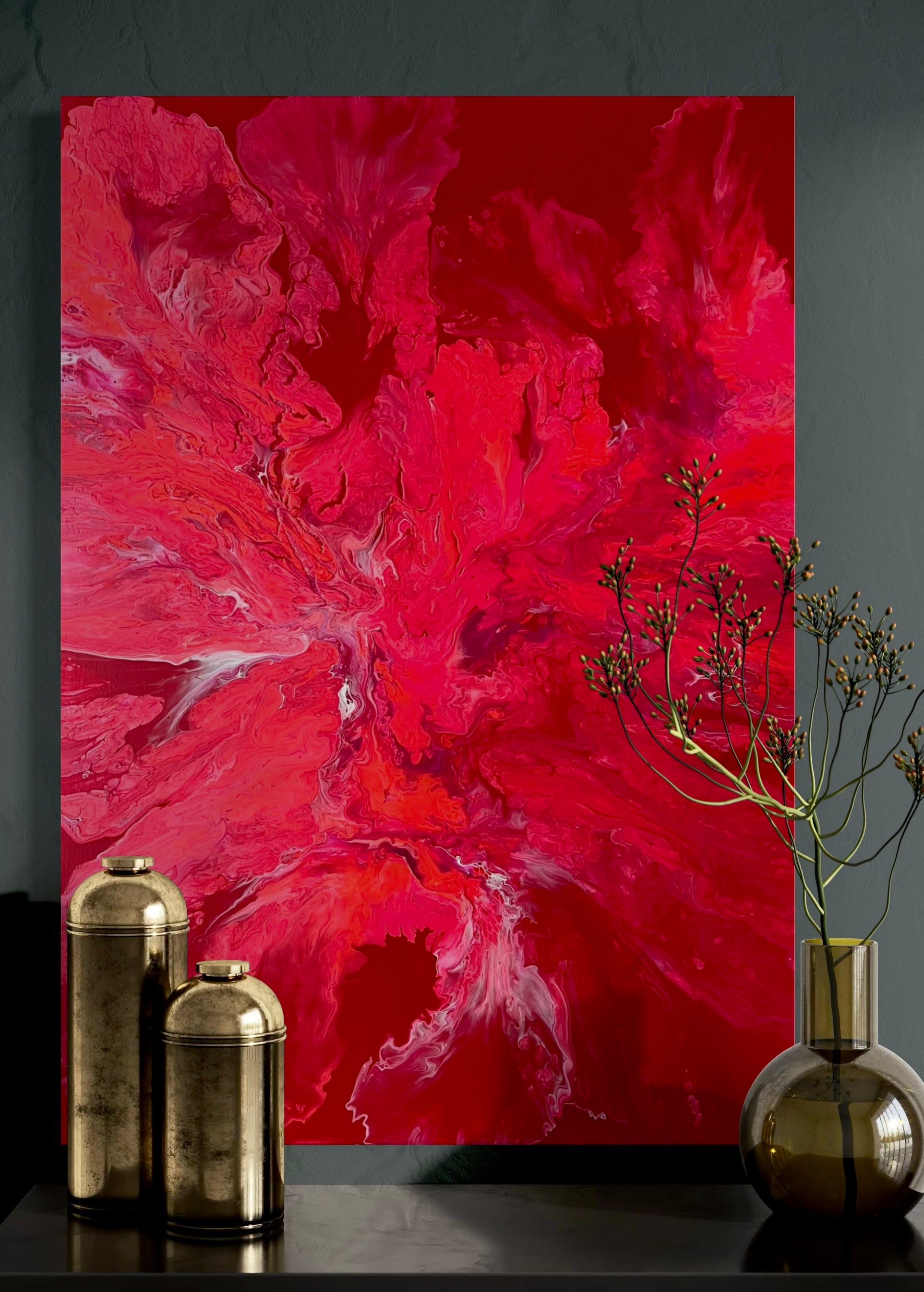 Abstract acrylic painting in intense red tones with flowing structures and dynamic play of colors - powerful fluid art artwork on a red background as a modern eye-catcher for expressive interior design.