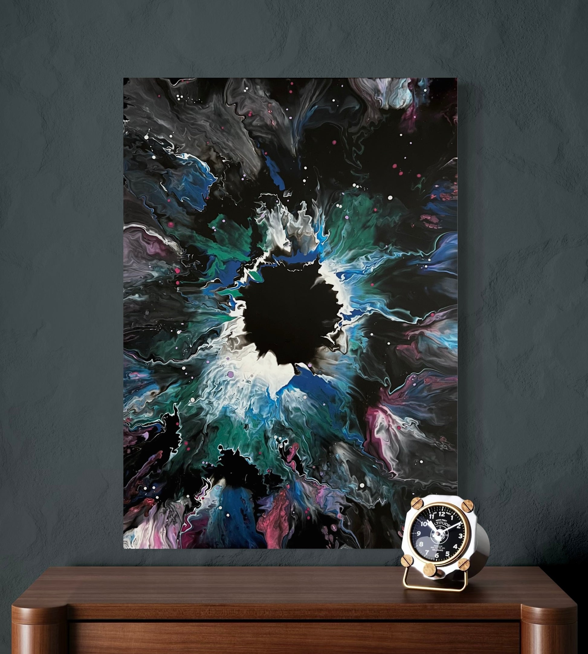 Abstract acrylic painting with a dark center and vivid color spill in green, blue, purple and white on a black background - modern fluid art artwork with explosive galaxy effect and dynamic depth.