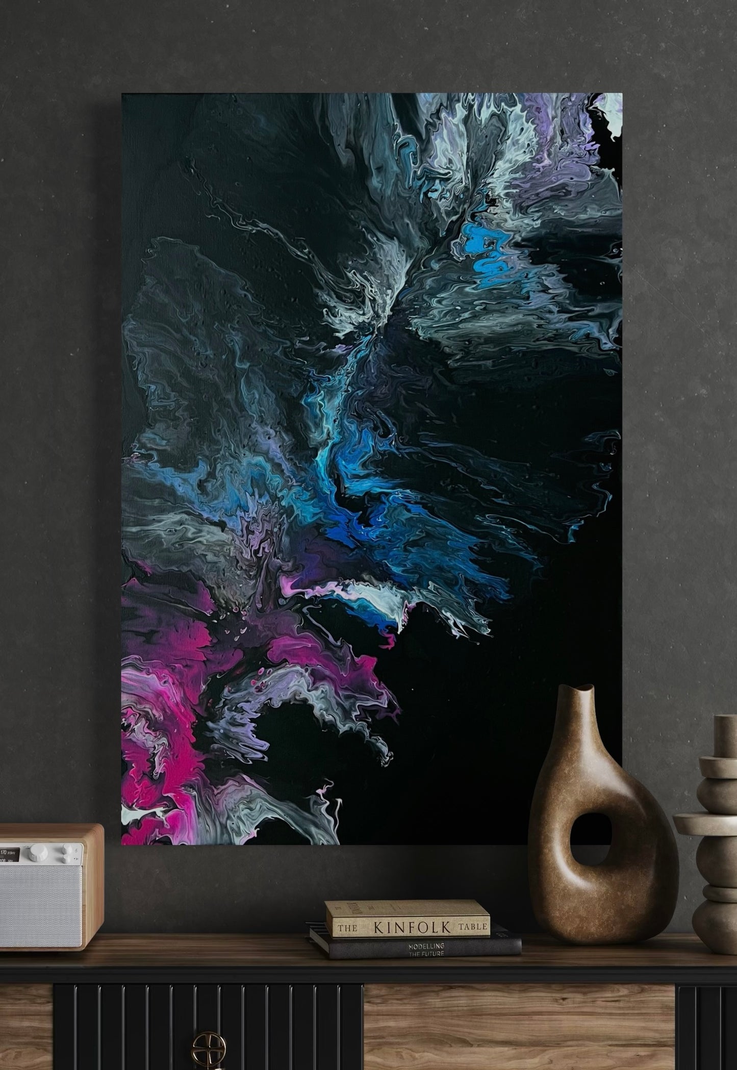 Abstract acrylic painting with dynamic color gradients in blue, turquoise, pink, violet on a black background - modern fluid art artwork with cosmic flair for stylish interior design.