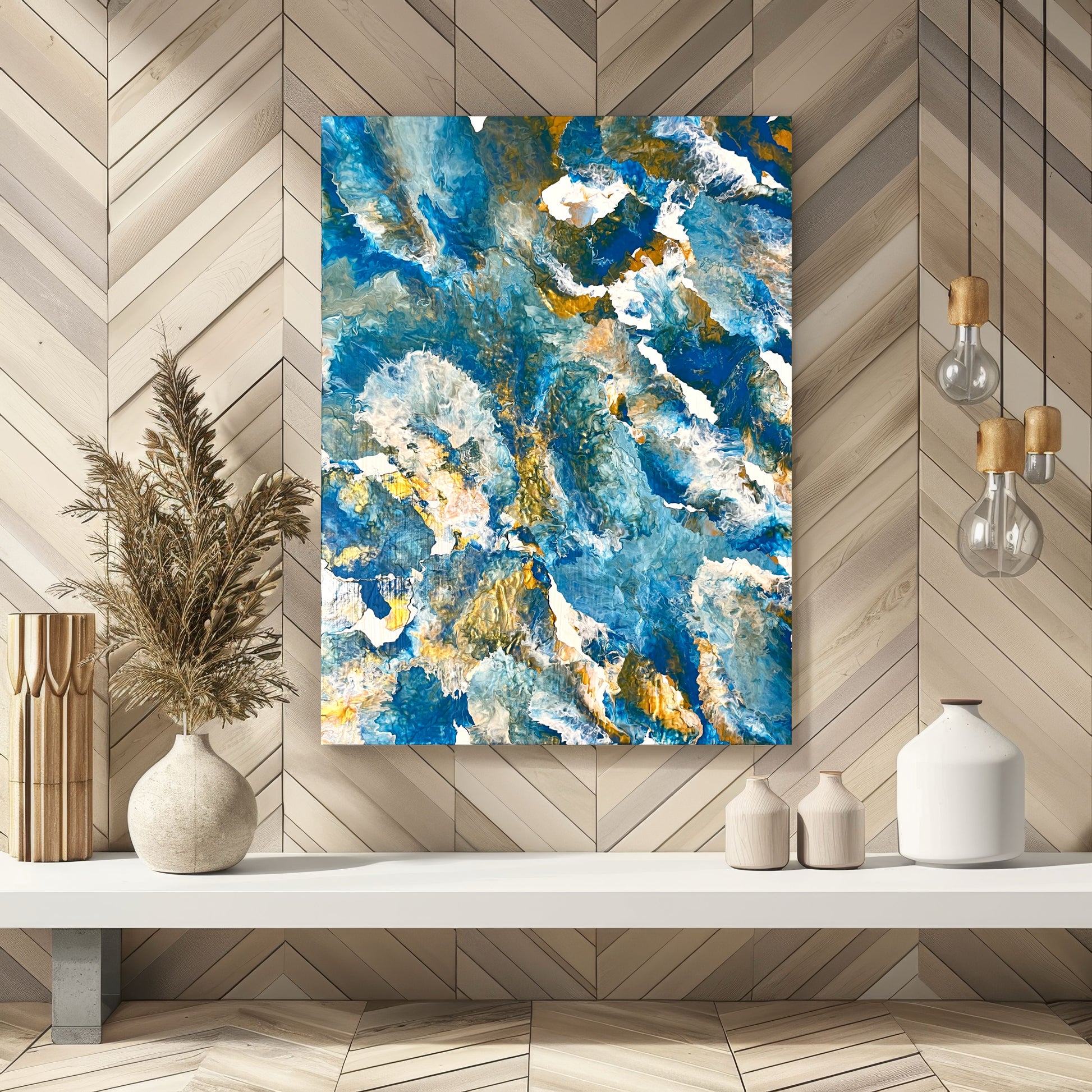 Abstract acrylic painting in shades of blue, turquoise, and gold with flowing, marbled structures. The composition is reminiscent of water, waves, or rock formations and radiates calm, depth, and natural elegance. Hand-painted, one-of-a-kind piece in the fluid art style—modern abstract art on canvas, inspired by the colors of the sea, ideal for stylish living rooms and gallery spaces.