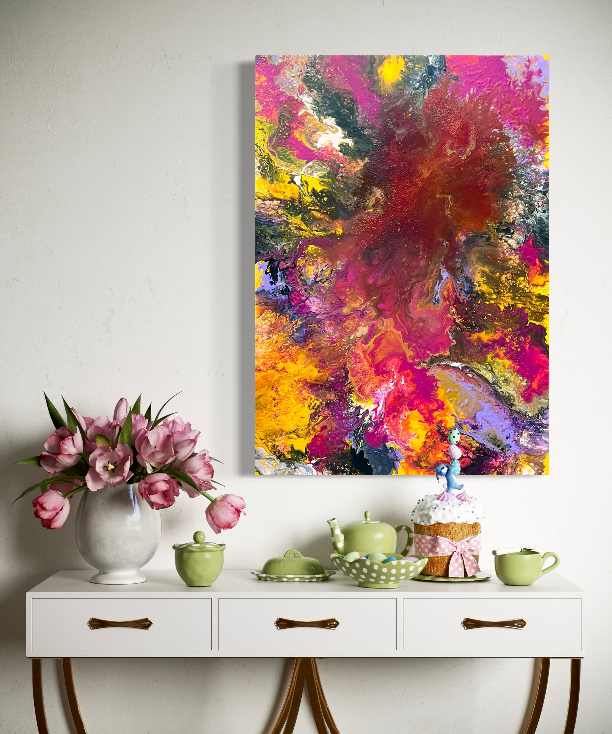 Abstract acrylic painting in intense shades of red, yellow, pink, and purple with vibrant, flowing structures and shimmering gold accents. The composition is reminiscent of an explosion of color and energy and conveys dynamism, passion, and creative freedom. Hand-painted unique piece in the fluid art style—modern abstract art on canvas, ideal as a colorful eye-catcher in living rooms or galleries.