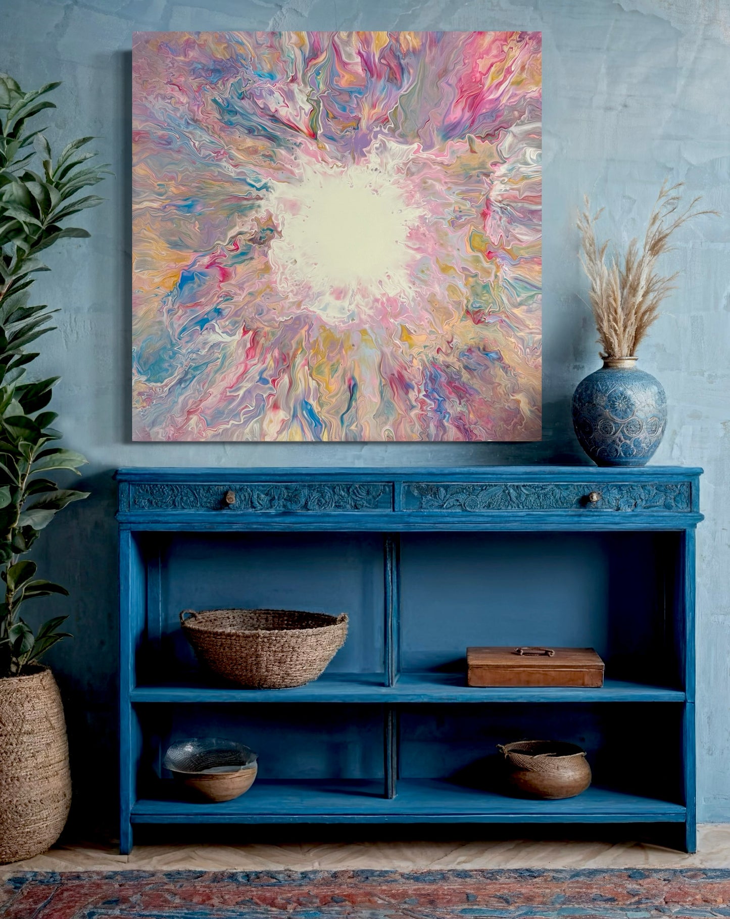 Abstract acrylic painting entitled "The Light" in soft pastel shades of pink, blue, yellow, and violet. A bright, light-filled center shines in the middle, surrounded by flowing, vibrant color gradients that evoke energy and new beginnings. Hand-painted, one-of-a-kind piece in the fluid art style—modern abstract art on canvas, symbolic of light, hope, and positive transformation.