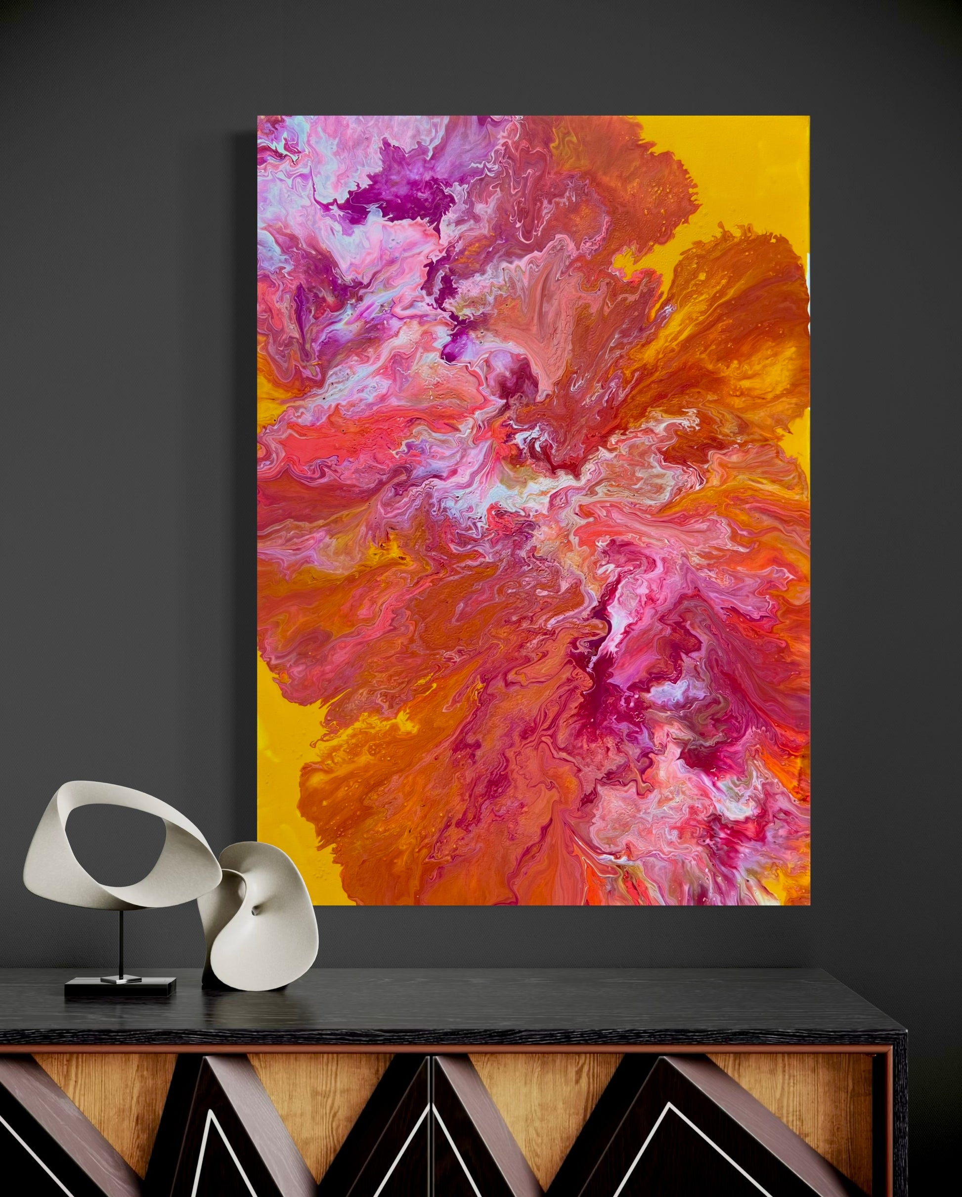 Abstract acrylic painting in bright shades of orange, pink, red, and yellow with dynamic, flowing color gradients. The energetic composition is reminiscent of fire, movement, and warmth, radiating vitality and creative expressiveness. Hand-painted, one-of-a-kind piece in the fluid art style—modern abstract art on canvas, ideal as a colorful eye-catcher for contemporary living spaces or galleries.